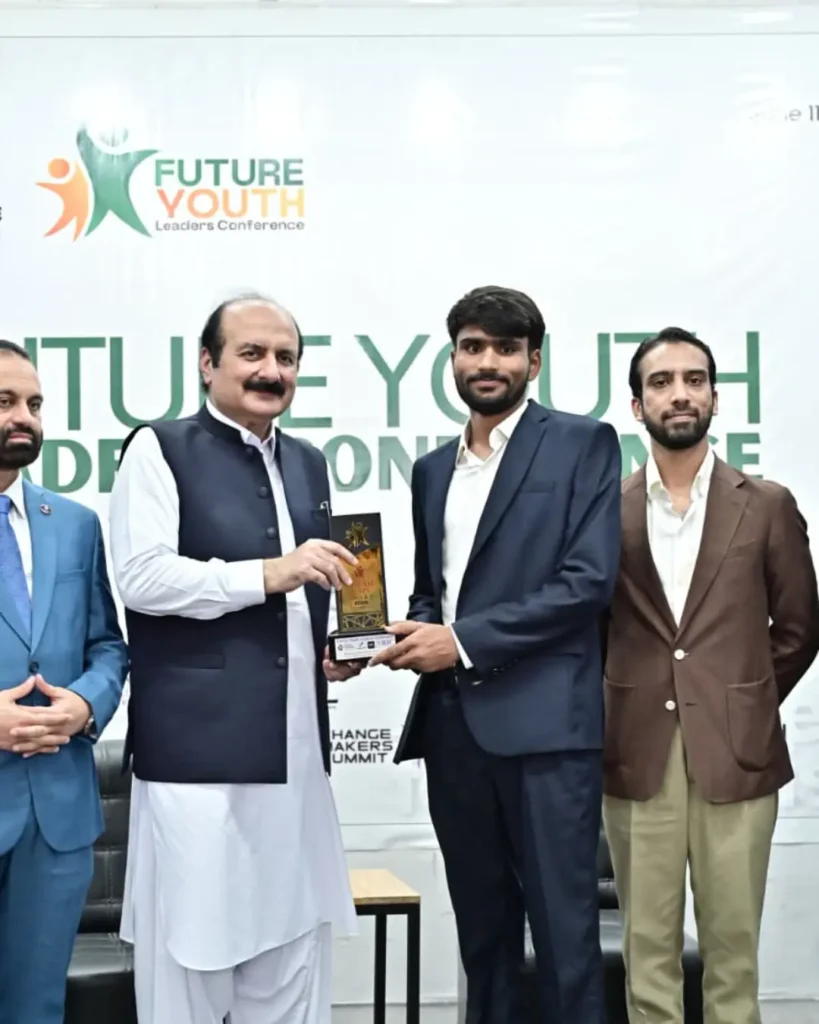 Muhammad Saqlain receiving the Youth Icon Award 2026 at the Future Youth Leaders Conference 2026